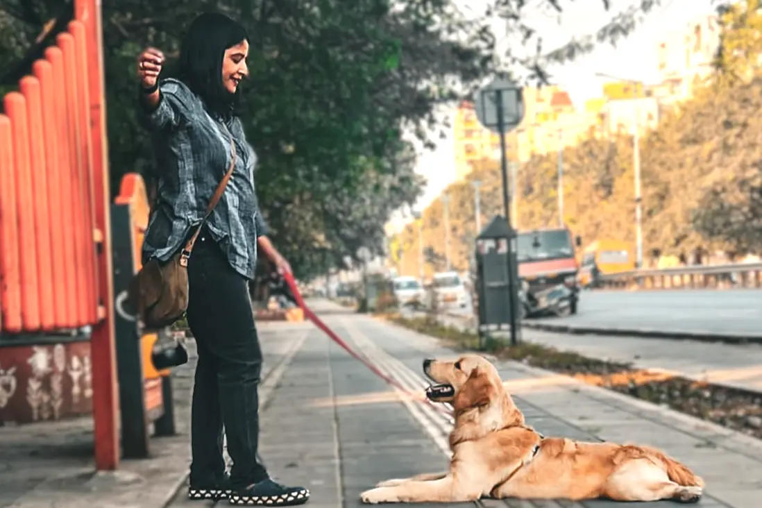 Puja Vinu with a dog